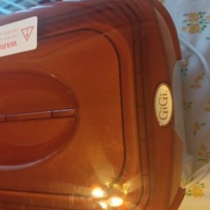 GiGi Wax WARMER.  With wax included. Works Perffect.